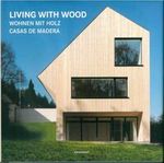 Cover of 'Living with Wood' book, showcasing elegant wood textures and design, ISBN 9783741920578.